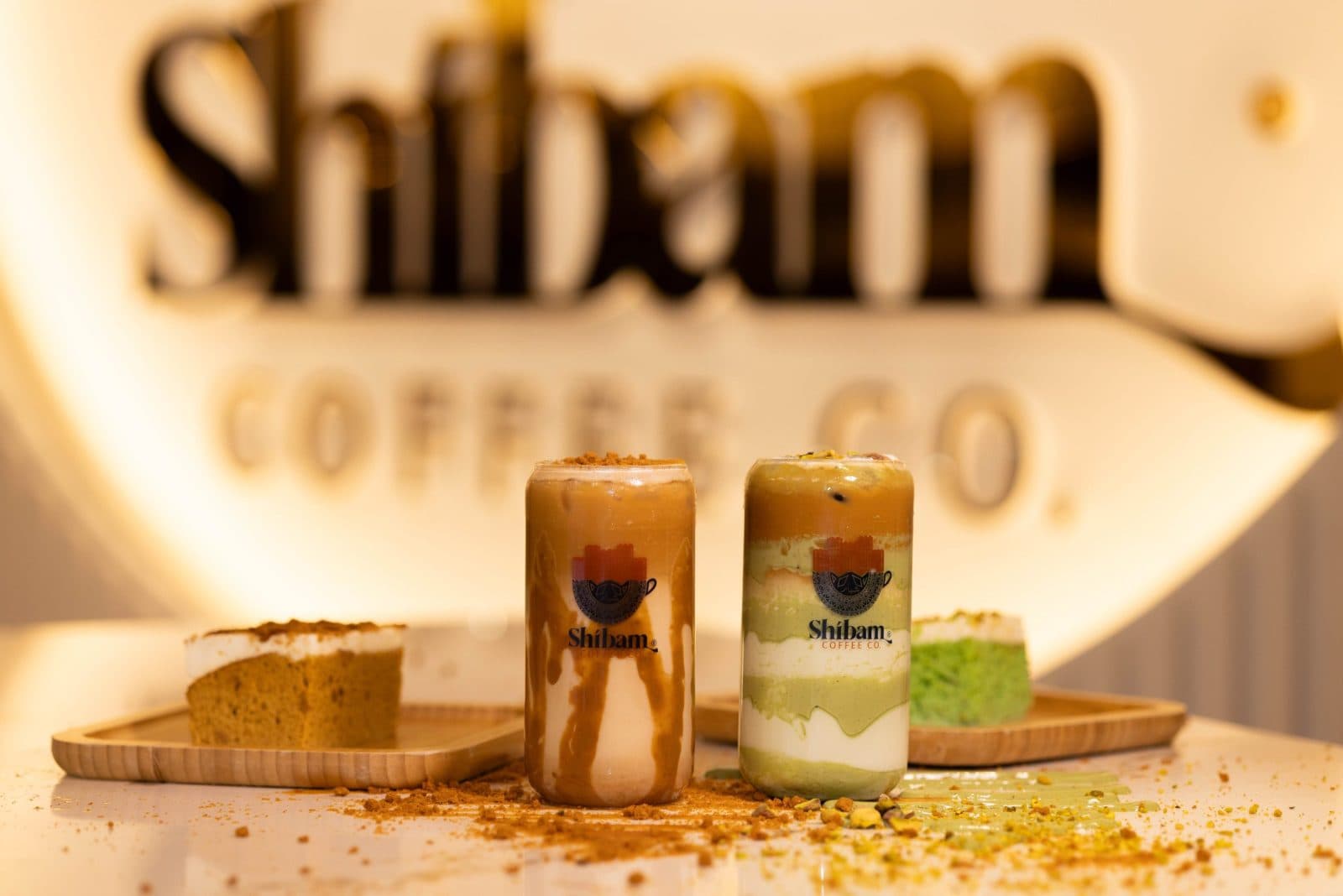 Shibam drinks and pastries arranged on a table