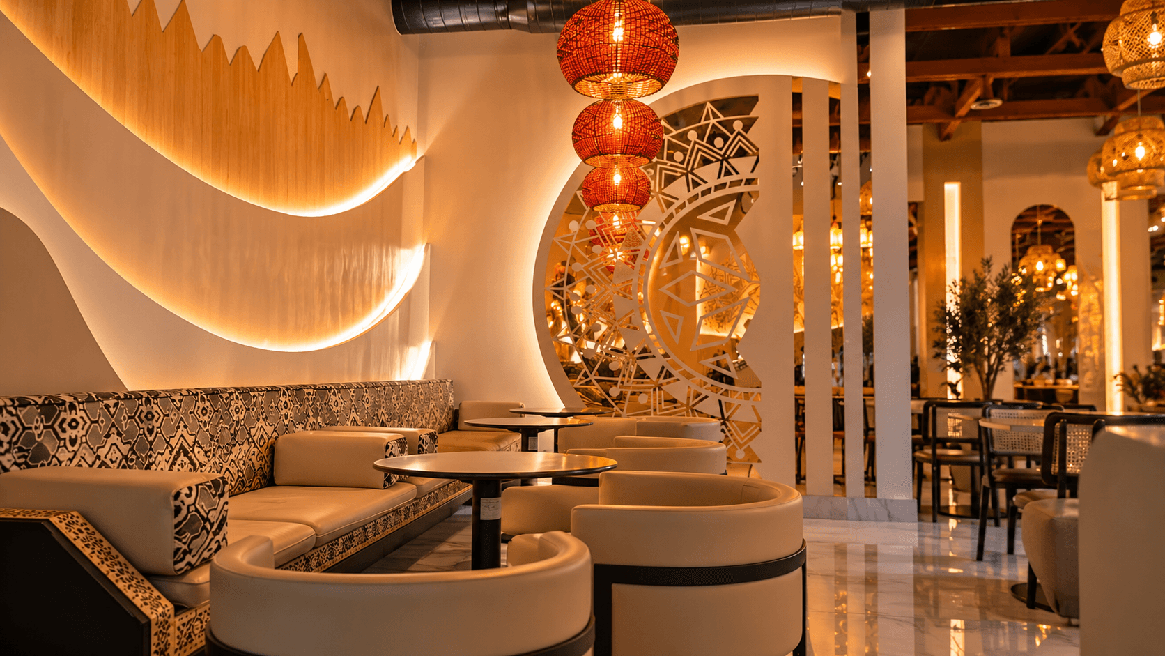 Warm Shibam Coffee interior with patterned seating and glowing lanterns