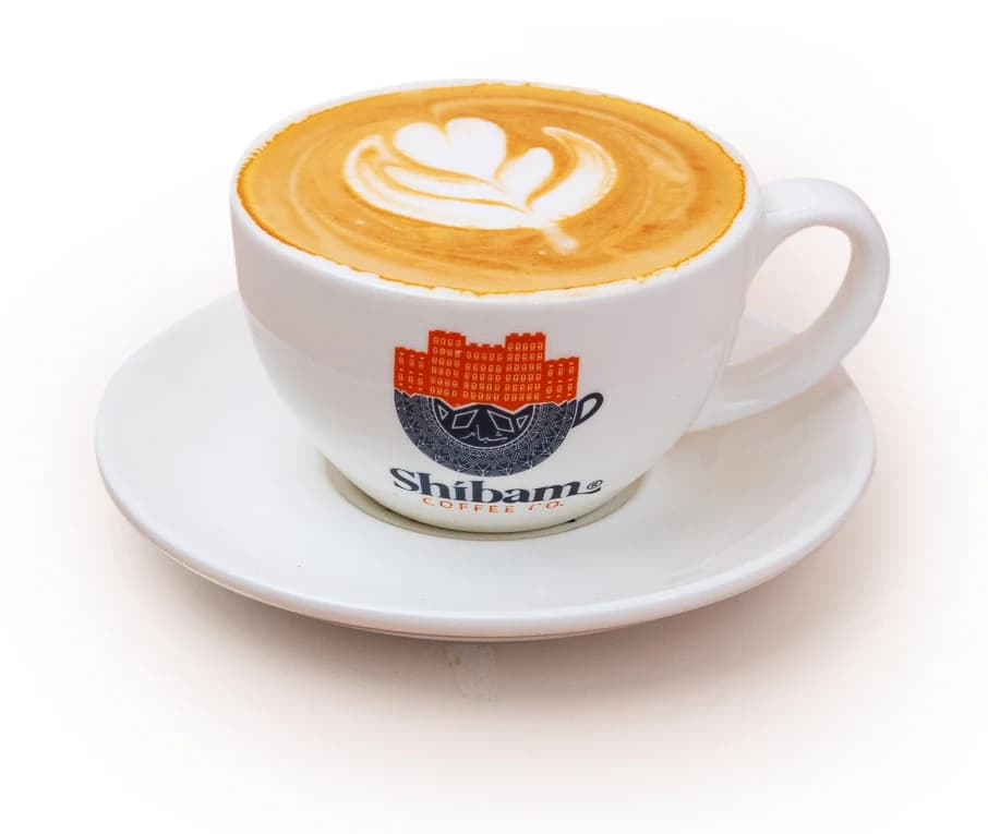 Cortado in a Shibam Coffee cup